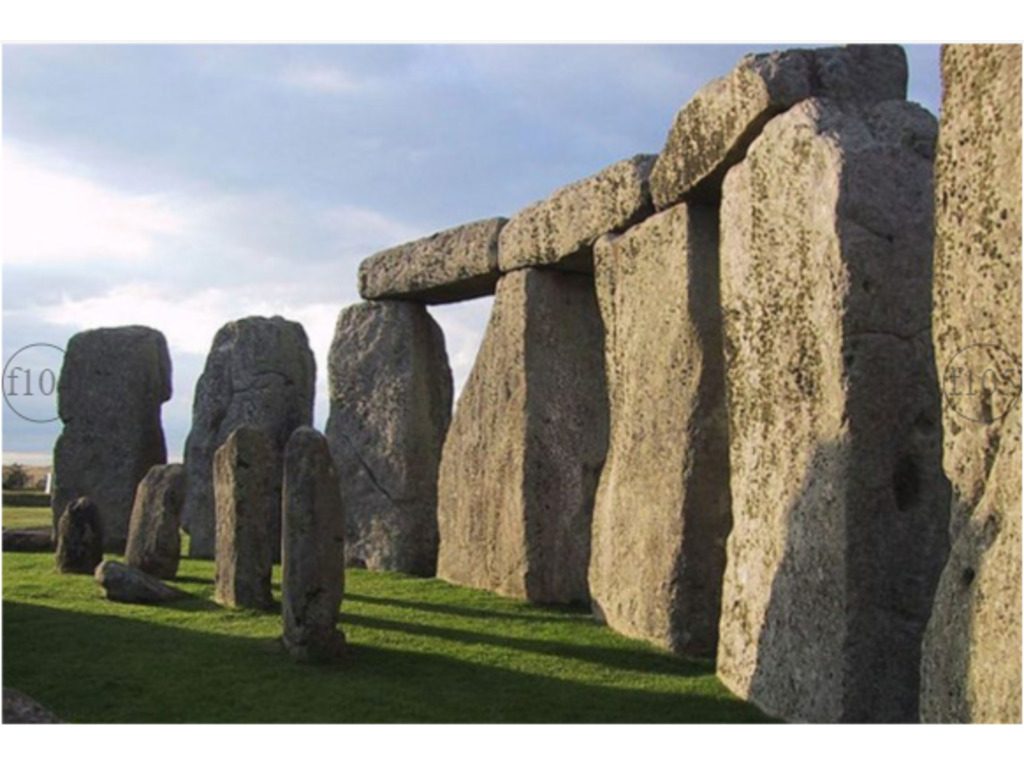Первобытная архитектура. Каменные столбы Стоунхендж. Мегалитические сооружения Стоунхендж. Стоунхендж, графство Уилтшир, Англия. Дольмены Стоунхендж.